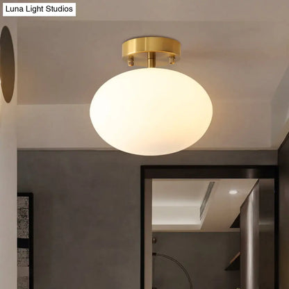 Minimalist Gold Oval Semi Flush Ceiling Light - 1-Light Cream Glass Lamp for Bedroom