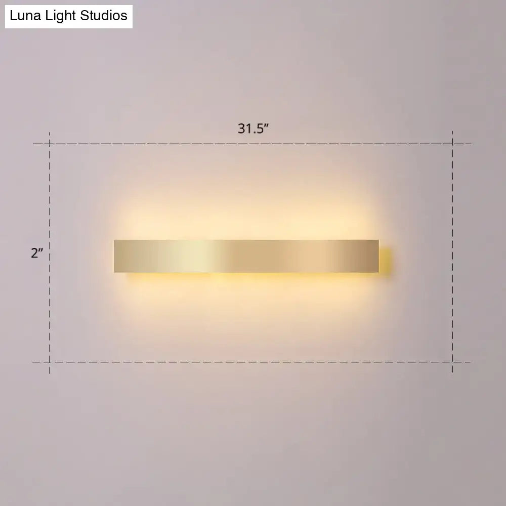 Minimalist gold plated led wall sconce with a sleek rectangular design for living room or bar lighting