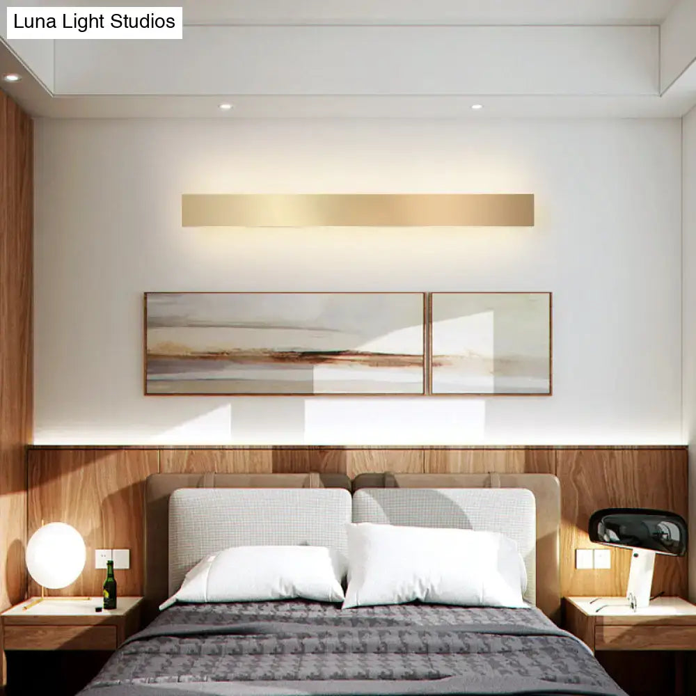 Minimalist gold plated rectangular led wall sconce with a sleek gold plated led design for living room or bar lighting