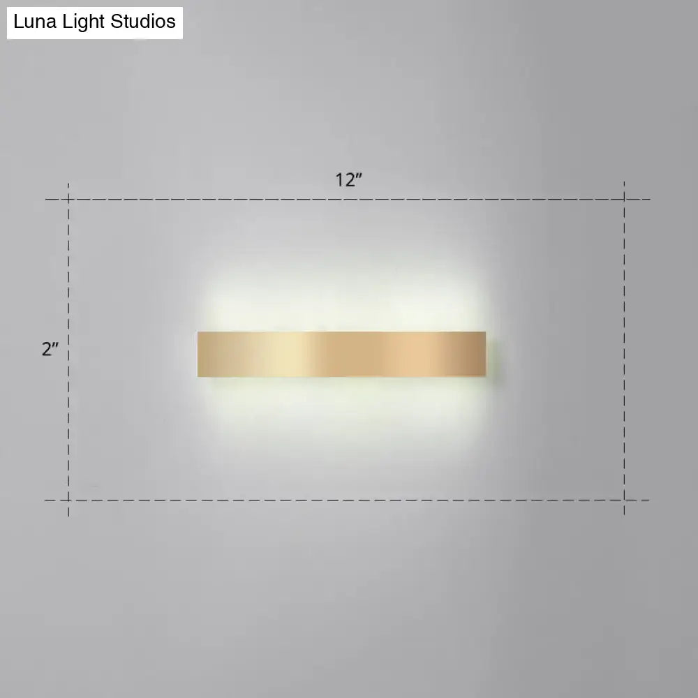 Minimalist gold plated led wall sconce with a brushed gold finish and modern rectangular design for living room bar lighting