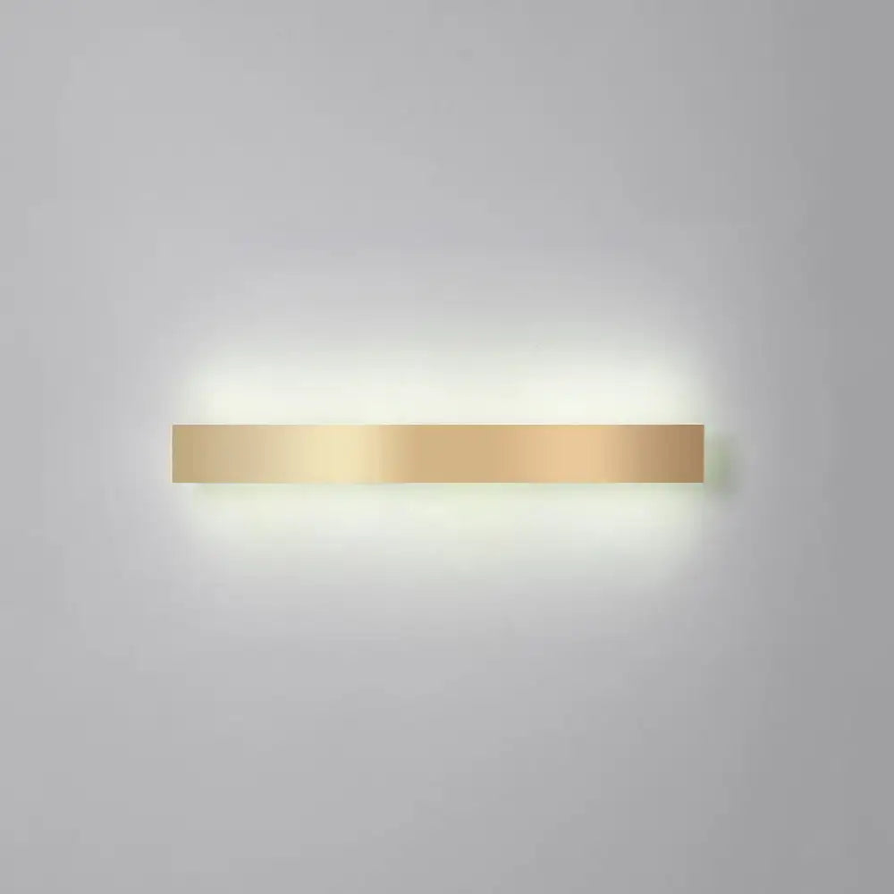 A sleek, rectangular minimalist gold plated led wall sconce with a gold plated led design for living room or bar lighting