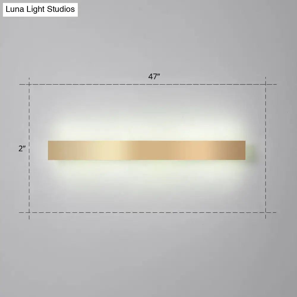 A sleek 47-inch minimalist gold plated led wall sconce with a rectangular design for living room or bar lighting