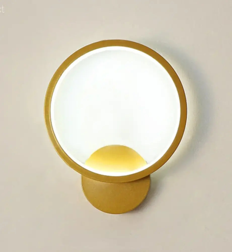 Minimalist gold-toned circular led wall light with frosted glass diffuser for living room decorbites led wall lights