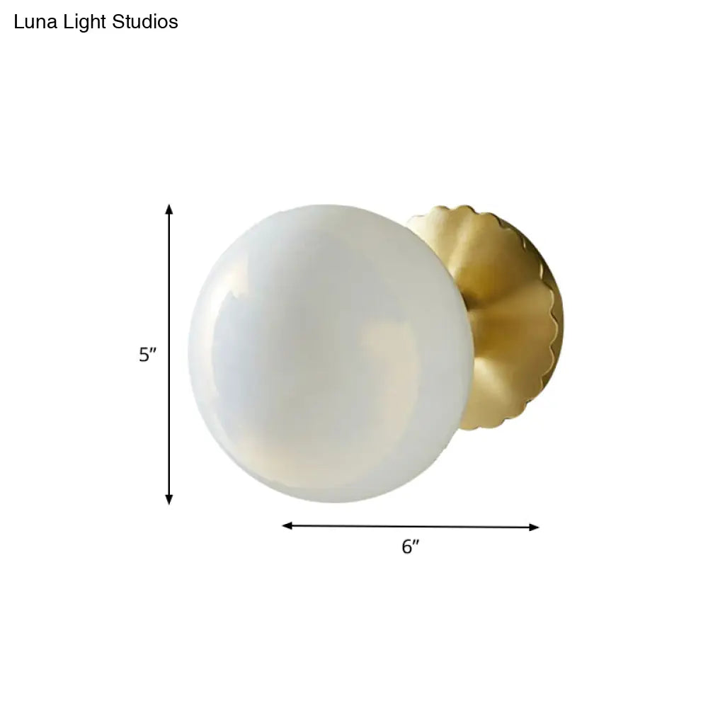 DecorBites™ DecorBites™ Minimalist Gold Wall Lamp with Glass Orb Shade - Perfect for Living Room
