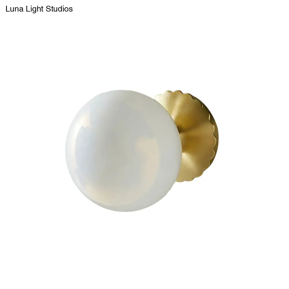 DecorBites™ DecorBites™ Minimalist Gold Wall Lamp with Glass Orb Shade - Perfect for Living Room