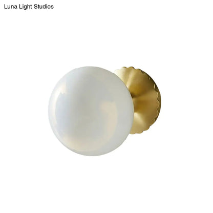 DecorBites™ DecorBites™ Minimalist Gold Wall Lamp with Glass Orb Shade - Perfect for Living Room