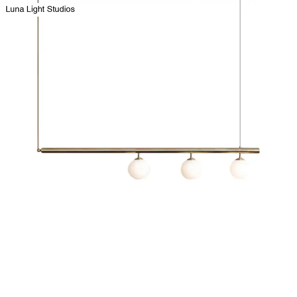 Decorbites™ golden glass shade minimalist brass bar pendant light with three frosted globe bulbs for dining room