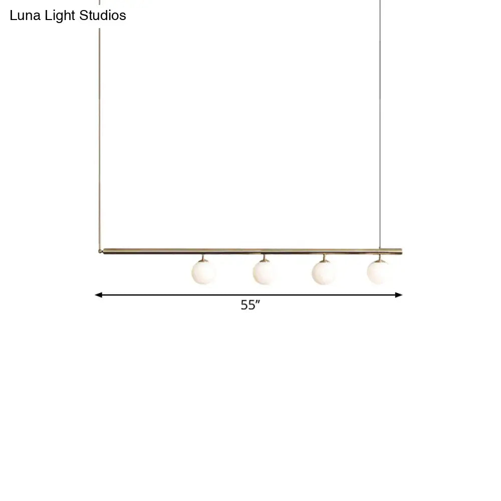 DecorBites™ golden glass shade hanging lamp with brass bar and white glass globes for dining room lighting