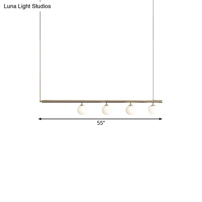 DecorBites™ golden glass shade hanging lamp with brass bar and white glass globes for dining room lighting