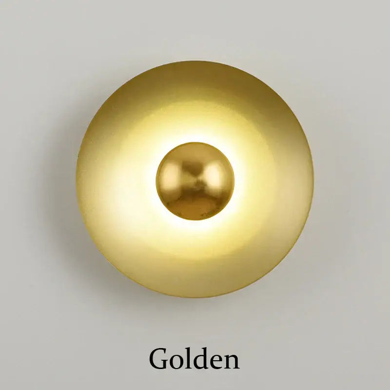 Minimalist decorbites golden macaroon led wall lamp with a golden brushed metal circular sconce and central sphere