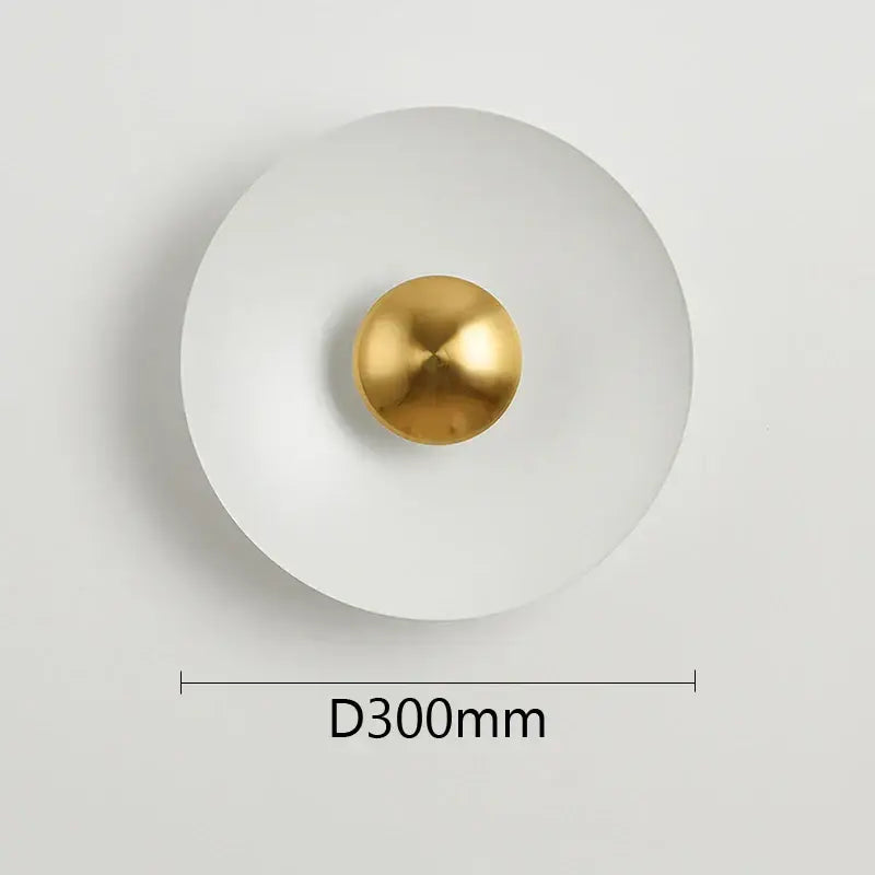 Minimalist white wall lamp with a polished gold spherical accent from decorbites golden macaroon led collection for ambient light