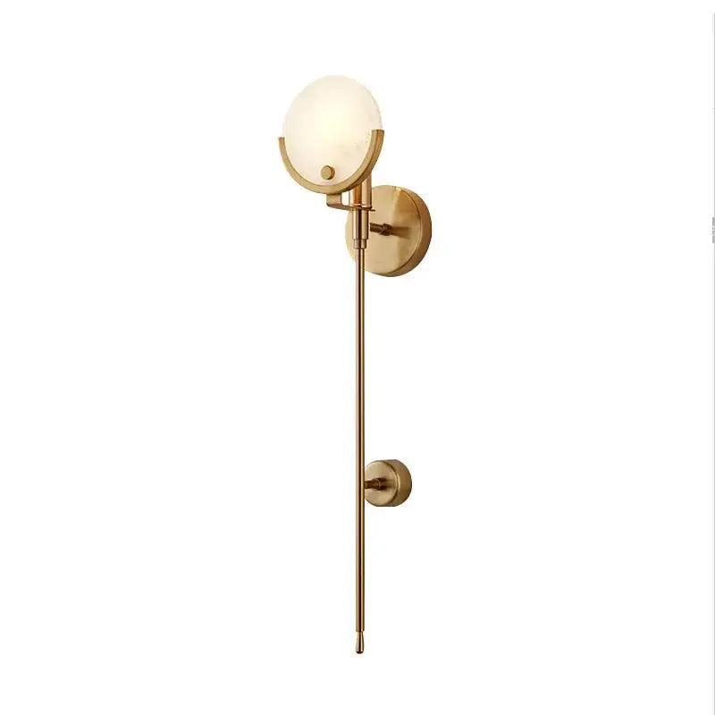 Minimalist golden marble wall lamp with gold-toned sconce and frosted glass globe for bedroom and living room decorbites golden marble