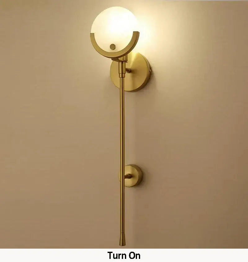 Minimalist golden marble wall lamp with gold finished sconce and frosted glass globe for bedroom and living room decorbites golden marble wall