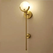 Minimalist golden marble wall lamp featuring gold-toned sconce with frosted glass globe for bedroom and living room decorbites golden marble