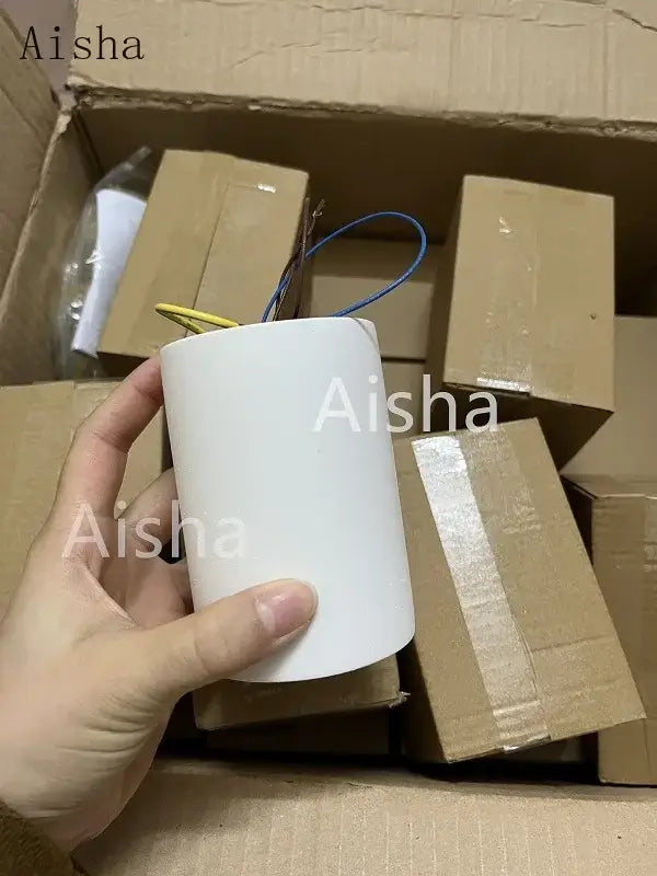 White cylindrical ceramic lamp socket with wiring visible from top for minimalist gray cement led round ceiling light decorbites cement led
