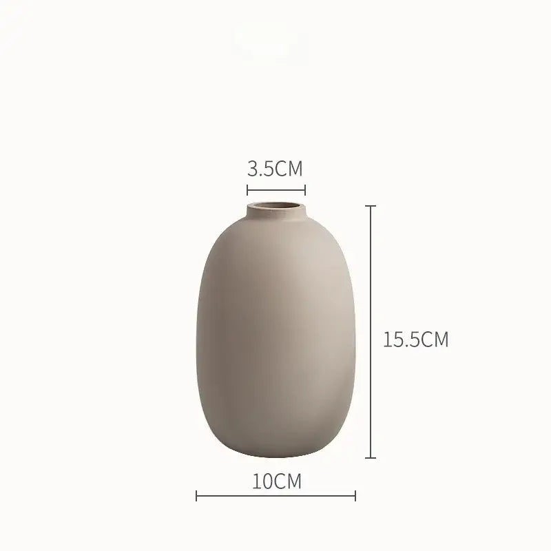 A sleek matte beige colorful ceramic vase with rounded body and narrow neck for minimalist living room decorbites colorful