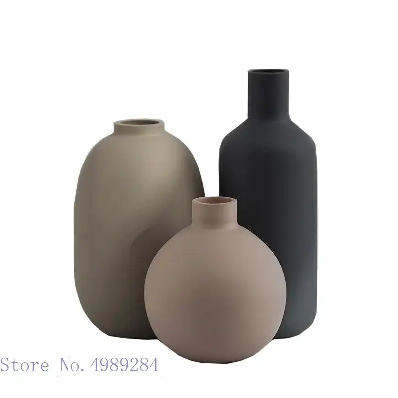 Set of three minimalist matte taupe and charcoal gray ceramic vases for living room decor by decorbites colorful ceramic