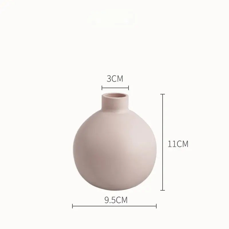 Minimalist gray pink and charcoal colorful ceramic vase with a rounded body and narrow neck for living room decorbites colorful ceramic use
