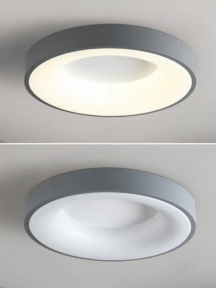 Minimalist gray round dining room ceiling lamp with sleek gray metal frame and soft white diffused illumination