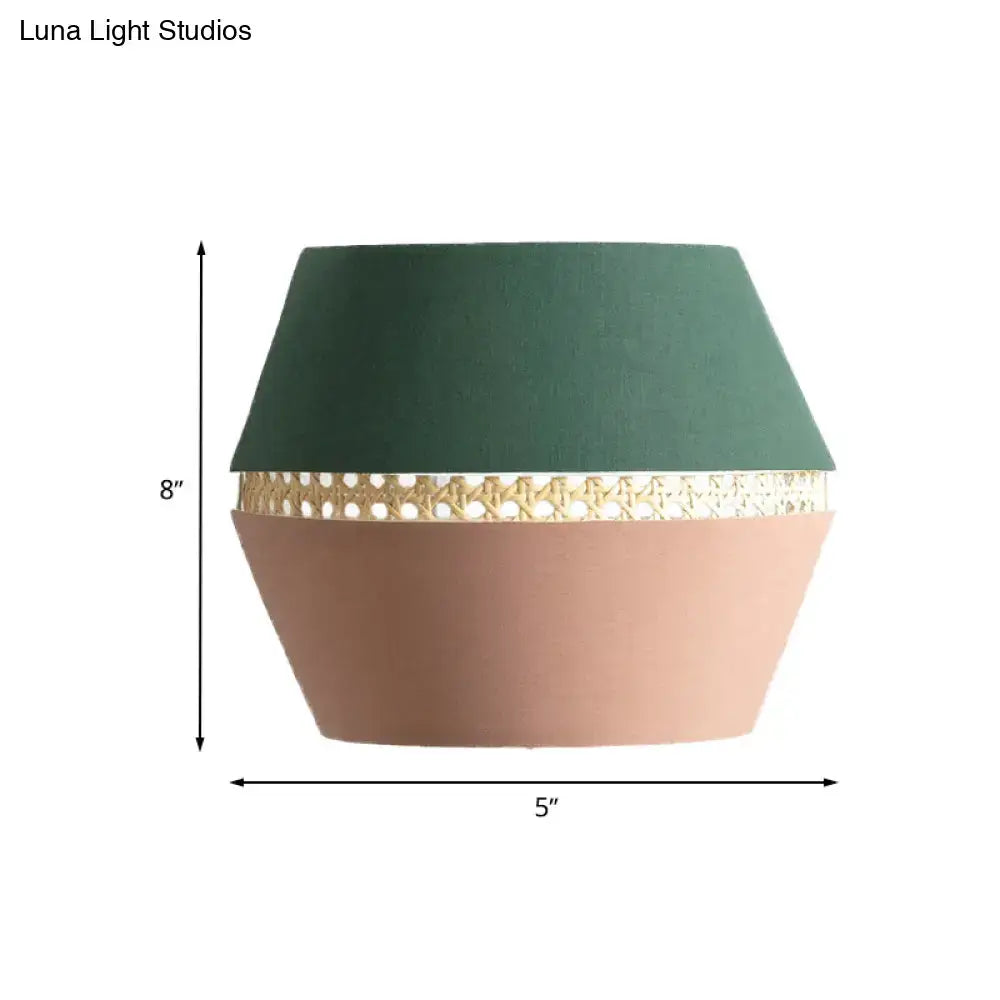 Minimalist green and terracotta rattan wall mount light with green velvet and blush pink direct wired electric wall lamp