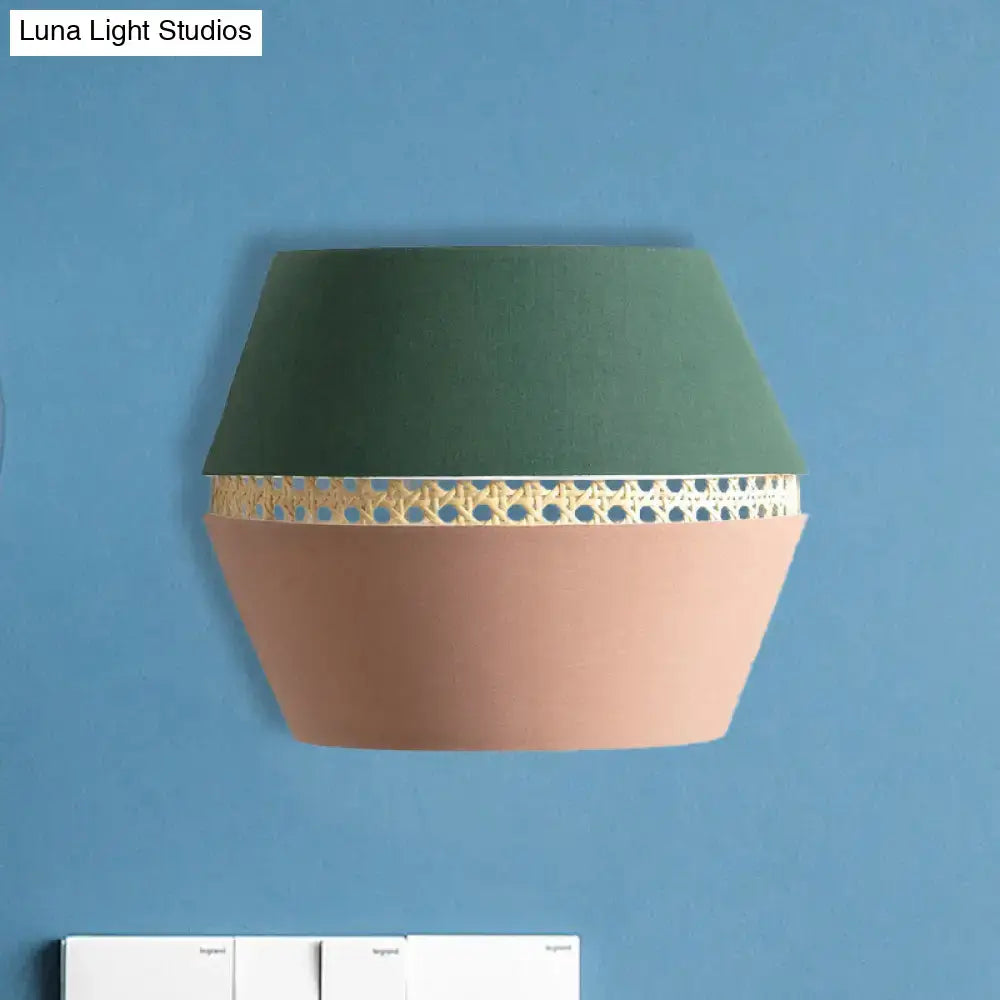 Minimalist green and terracotta rattan wall mount light with direct wired electric and a gold woven band wall lamp