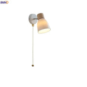 Minimalist iron wood led wall lamp with white base, wood-finished top, frosted glass shade, and brass pull chain decorbites wall lamp