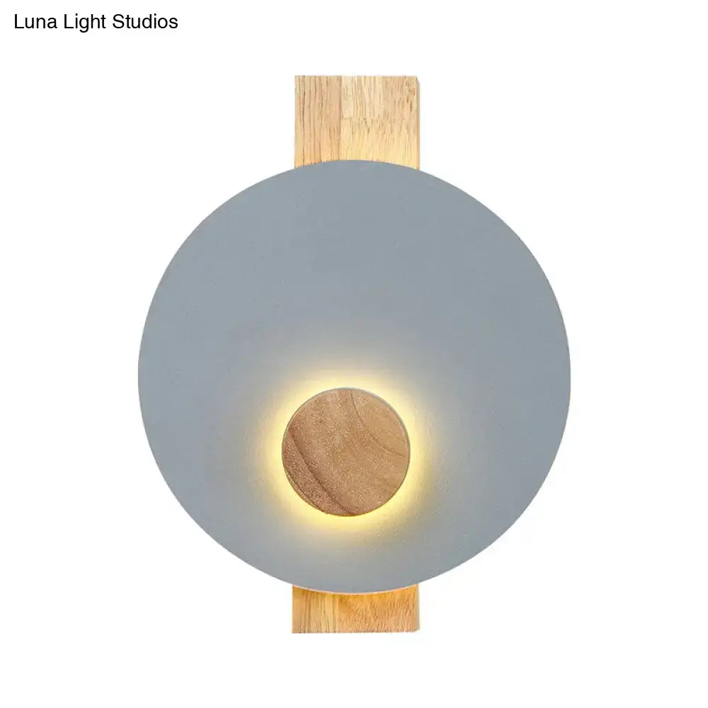 Minimalist led gray metal disk wall sconce with matte gray shade and natural wood accents for 110v-120v use