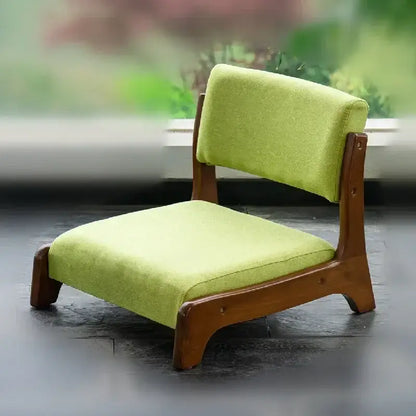 Minimalist wooden legless tatami chair with lime green upholstered seat and backrest for meditation by decorbites