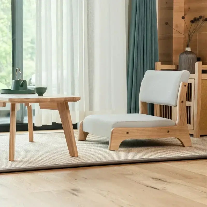 Minimalist wooden legless tatami chair with light gray upholstered seat and backrest for living room meditation by decorbites