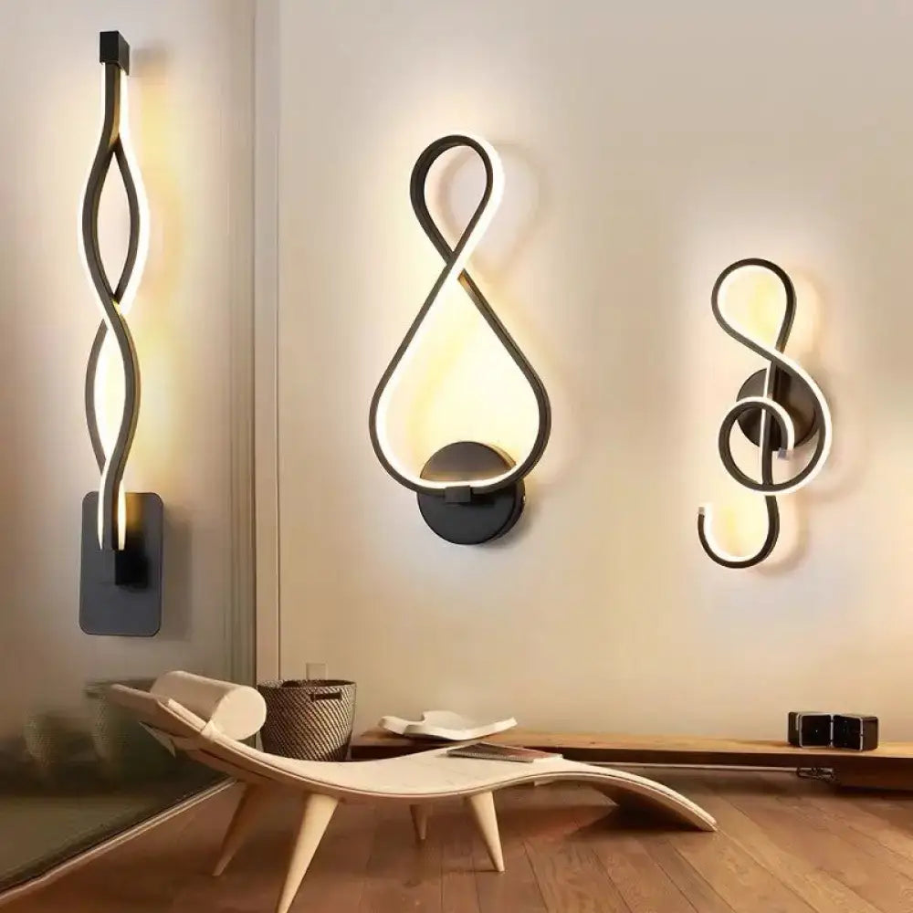 Modern black metal minimalist line art sconce light fixture with sleek musical note inspired design for hallway use