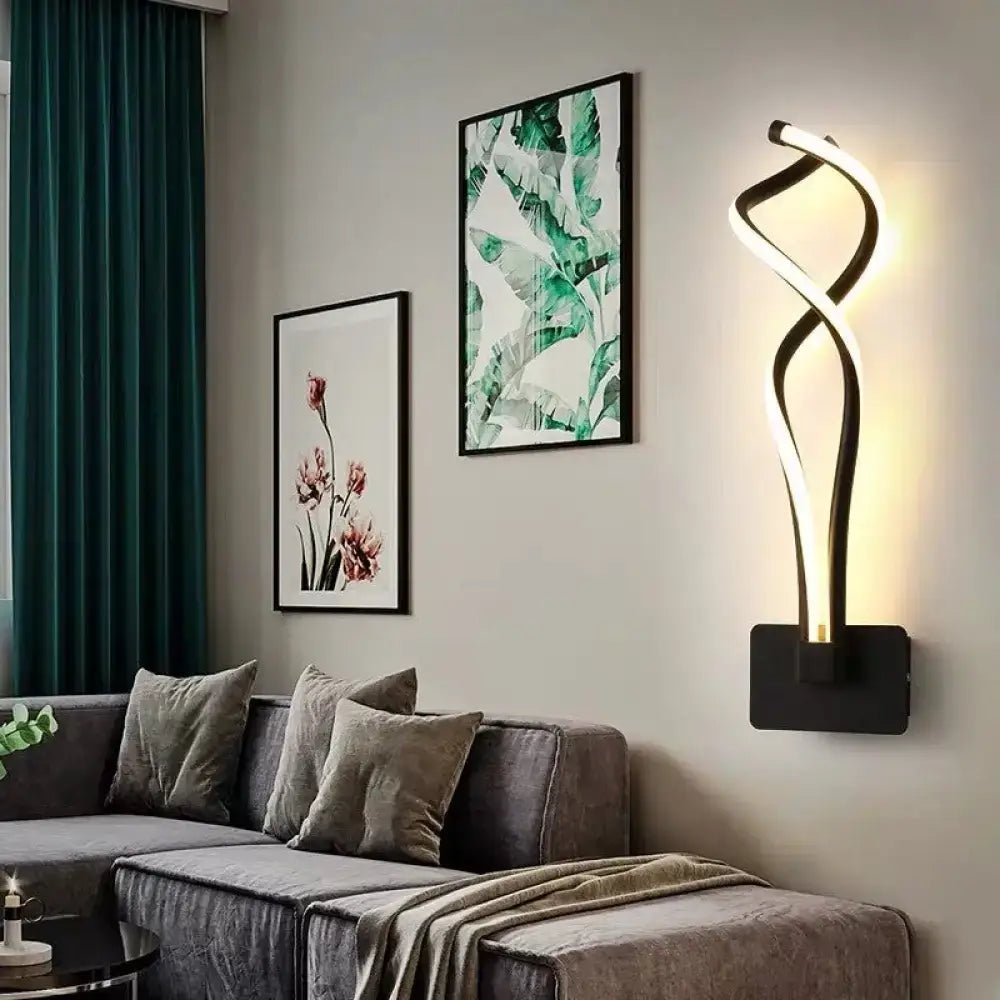 Minimalist line art black metal sconce light fixture with sleek twisted design for hallway lighting