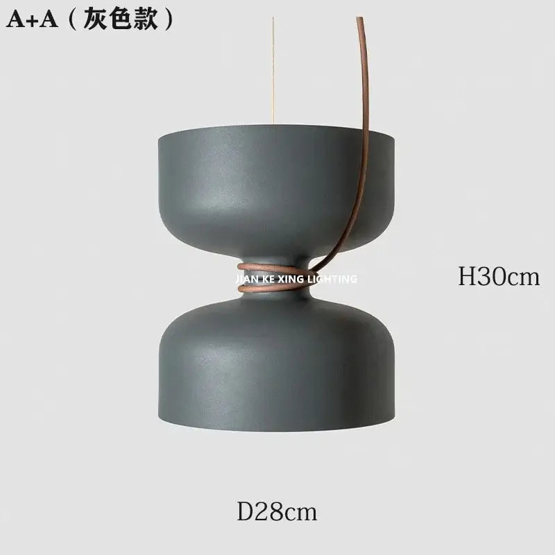 A sleek matte gray a+a pendant light with dual-bowl design and brown leather strap for decorbites forged iron chandelier