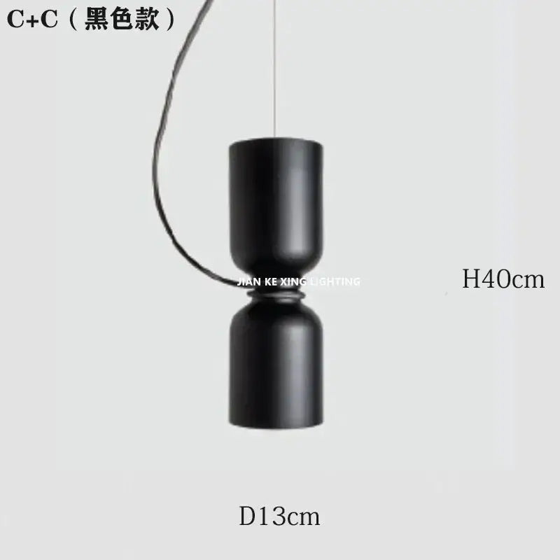 Black cylindrical pendant light with matte finish for dining room decorbites forged iron chandelier design