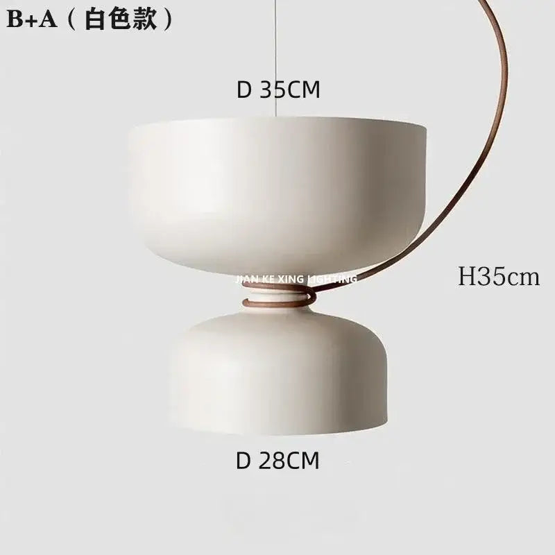 Minimalist matte black and off-white pendant light with copper accent and tiered shades for dining room decorbites forged iron chandelier
