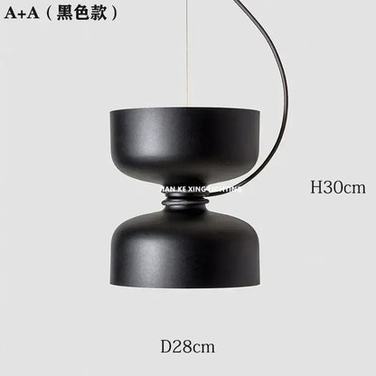 Minimalist matte black a+a pendant light with curved wire suspension in forged iron chandelier style for dining room decorbites