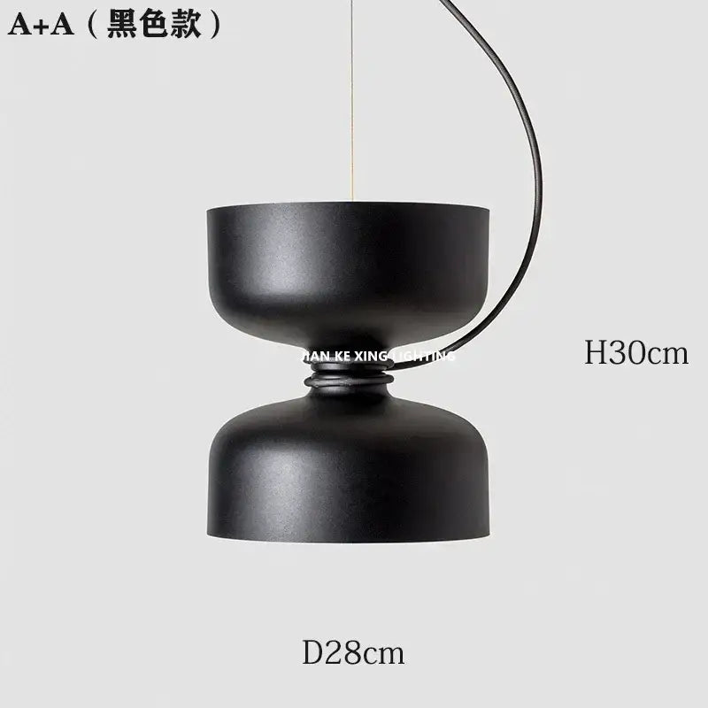 Minimalist matte black a+a pendant light with curved wire suspension in forged iron chandelier style for dining room decorbites