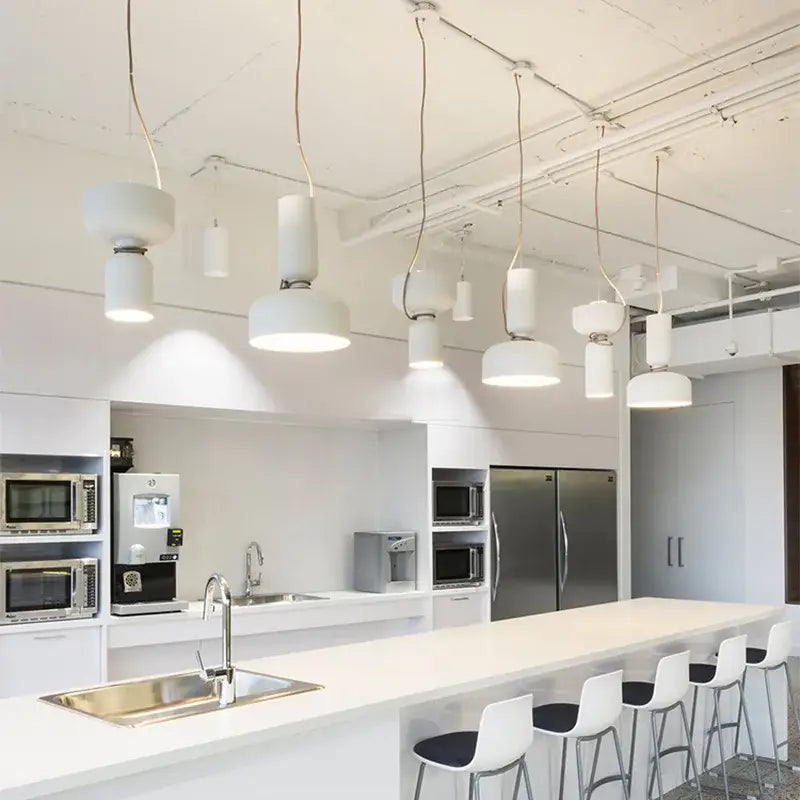 Modern white pendant light with sleek cylindrical shades in matte black decorbites forged iron chandelier for dining room