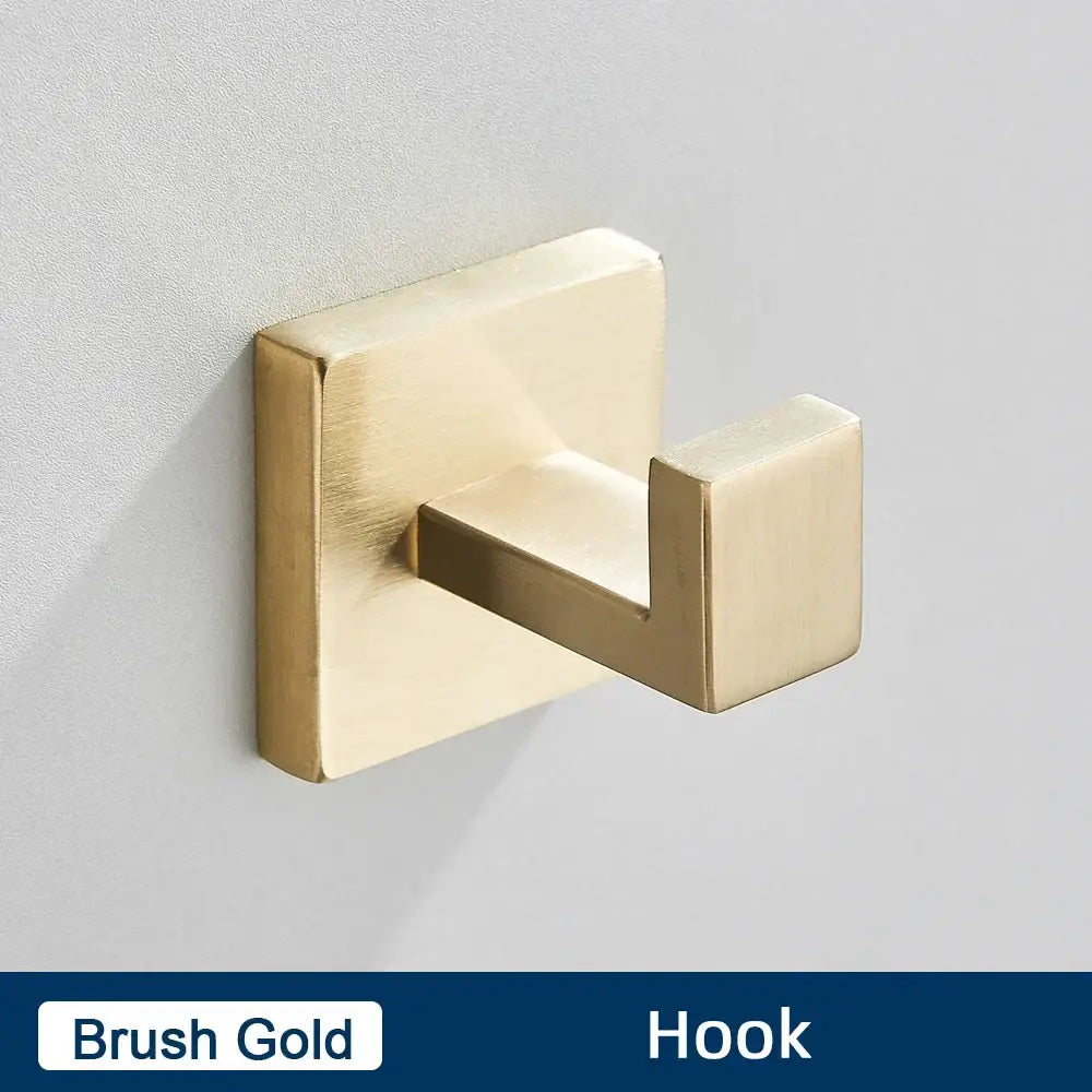 Brush gold wall-mounted hook in a minimalist matte black stainless steel bathroom accessories set for modern bathrooms