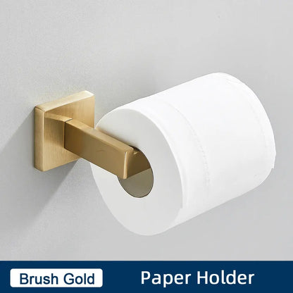 Brush gold bathroom paper holder in a minimalist matte black stainless steel bathroom accessories set holding white paper roll