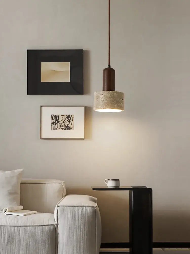 Minimalist pendant lamp with matte brown cylindrical top and textured off-white concrete shade for decorbites cream wind led