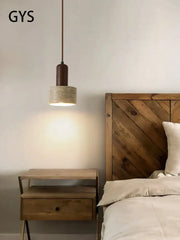 Minimalist pendant lamp with matte brown top and textured concrete shade by decorbites cream wind led for dining room
