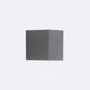 A minimalist matte gray concrete wall sconce with a square shape designed as a corridor led light block