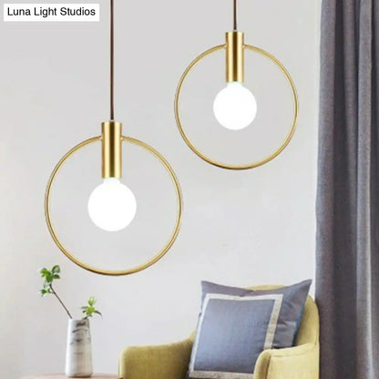 Minimalist Metal Pendant Light with Ring Pendulum Design - Single Bulb Brass Finish Fixture