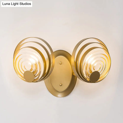 DecorBites™ DecorBites™ Minimalist Metallic Gold Swirling Wall Sconce - Elegant 1/2-Light Round Lighting Idea