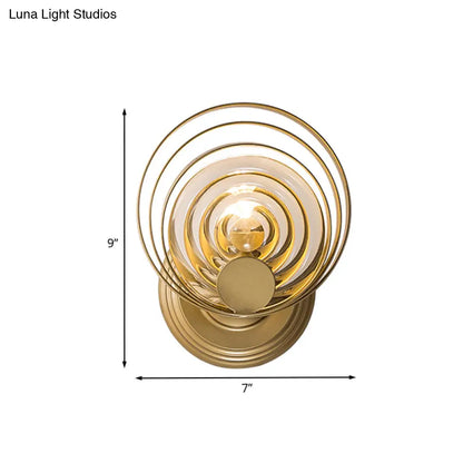DecorBites™ DecorBites™ Minimalist Metallic Gold Swirling Wall Sconce - Elegant 1/2-Light Round Lighting Idea