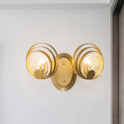 DecorBites™ DecorBites™ Minimalist Metallic Gold Swirling Wall Sconce - Elegant 1/2-Light Round Lighting Idea