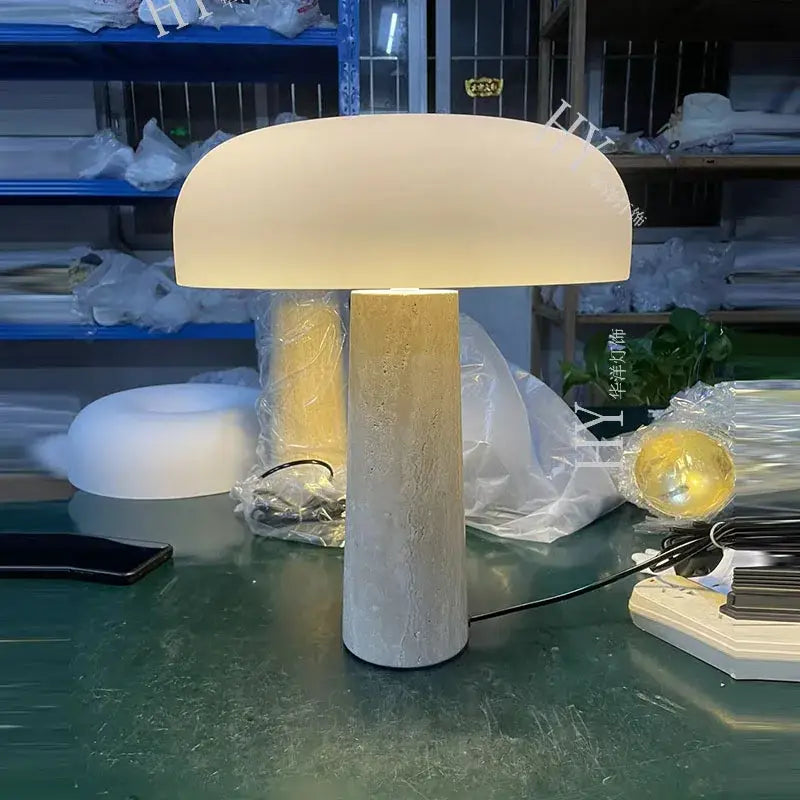 Minimalist mushroom cave stone table lamp with warm frosted glass shade and textured gray concrete base for bedroom decorbites cave stone