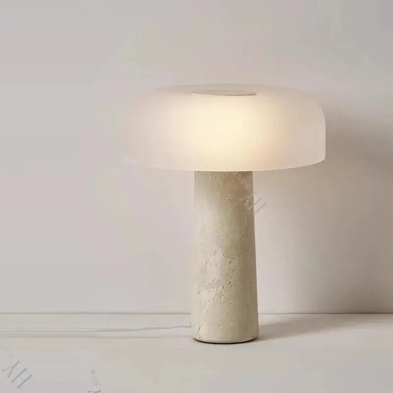 Minimalist mushroom-shaped table lamp with frosted glass shade and textured decorbites cave stone table base for bedroom