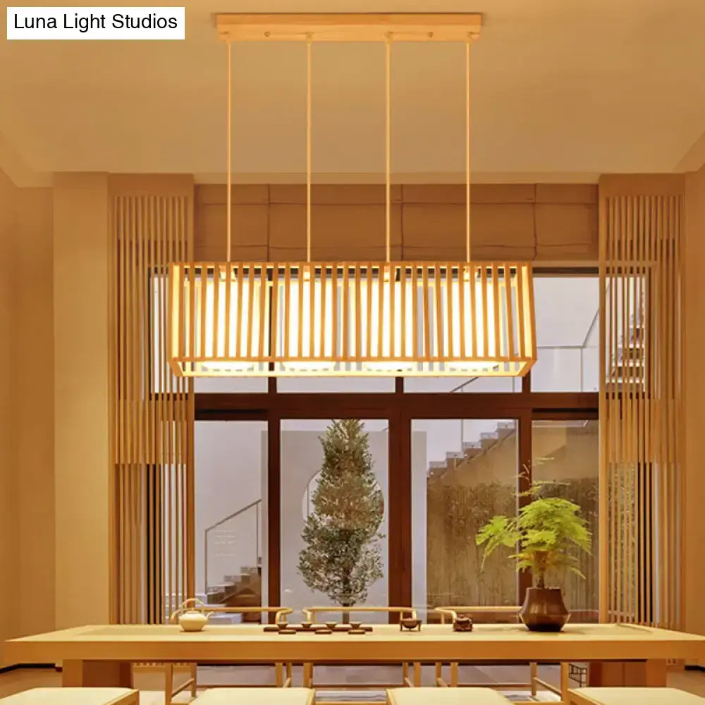 Decorbites™ asian wood island pendant light with natural wood finish and warm glow made of wood slats suspended by cords