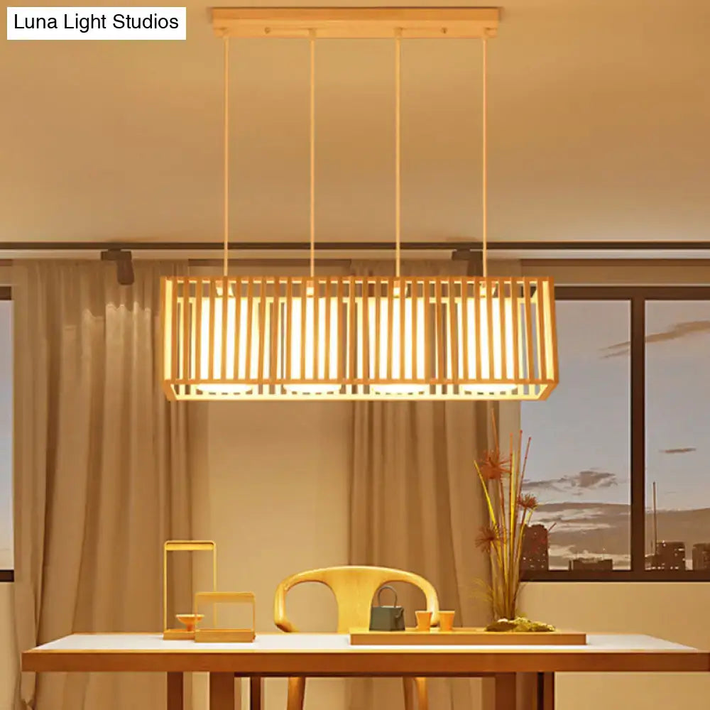 Decorbites asian wood island pendant light in natural wood finish with rectangular vertical slats and warm ambient glow